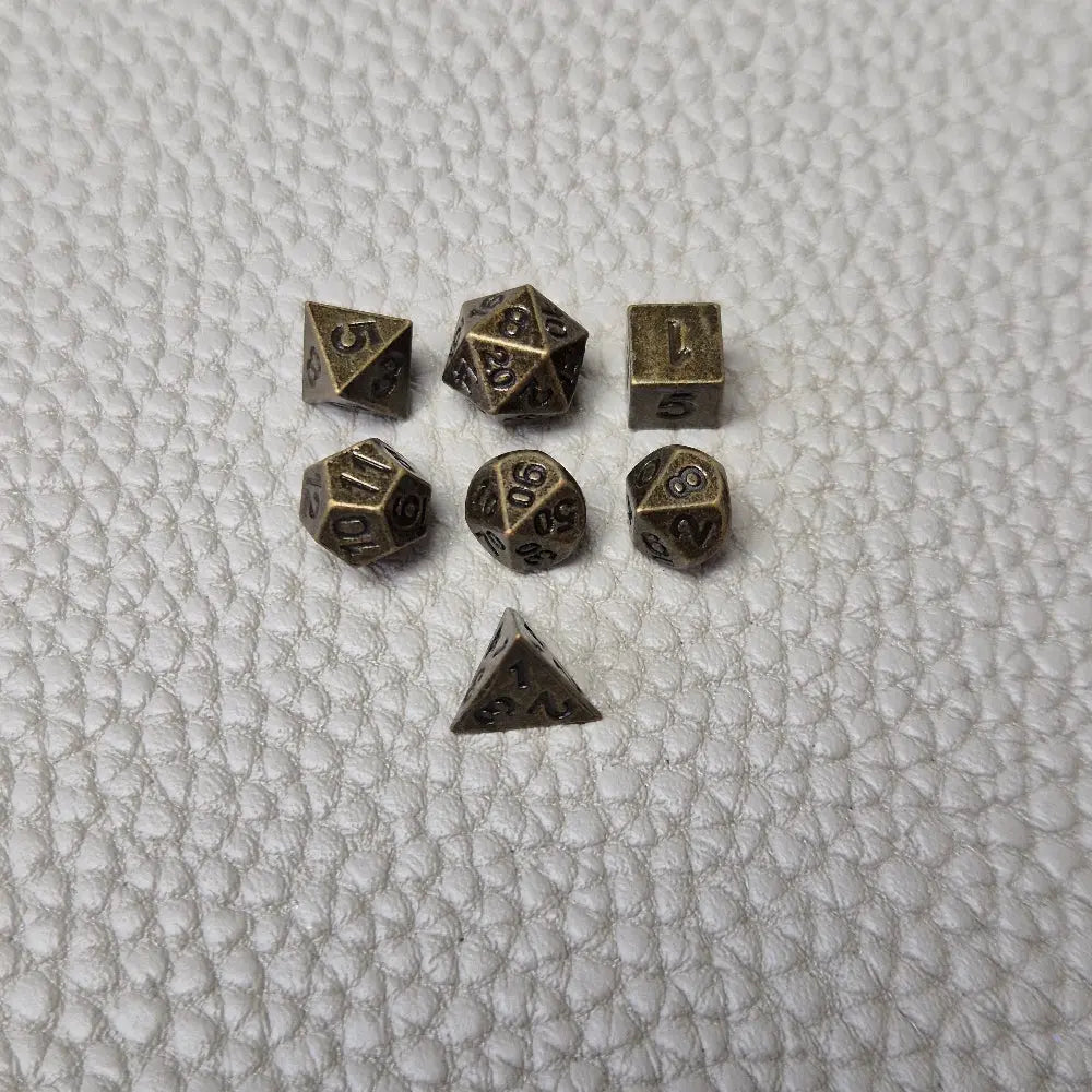 A Bronze coloured full metal pocket watch themed dice locket, with engraved backside and detailed dragon on the front. Contains full set of metal dice inside