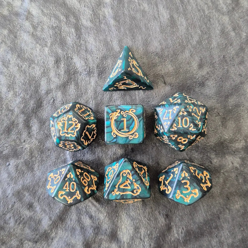 Acrylic D&D dice set with emerald green swirls and antique gold arcane-style numbering, displayed on a textured dark surface.