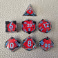 A set of clear sharp-edge resin dice with black ground color and red rose inside.