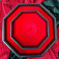 Octagonal red dice tray with dragon emblem and black leather edge, shown open.